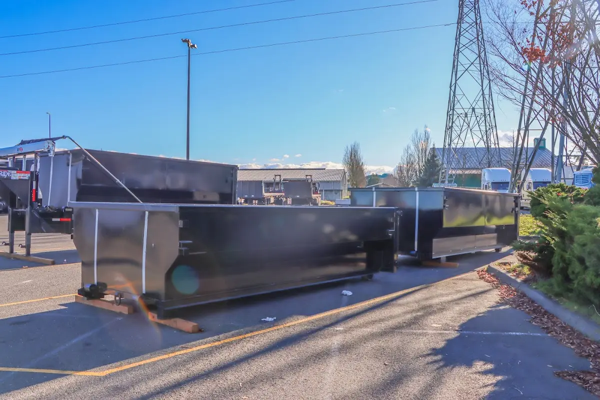 Roll-off dumpster ready for waste disposal at job site for Construction Dumpster Rental in Portland